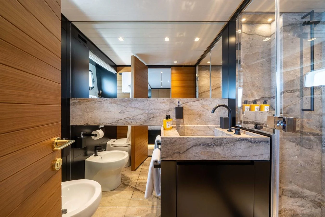 The yacht's bathroom features modern fixtures and luxurious finishes. aboard JACKI 8 Yacht for Sale
