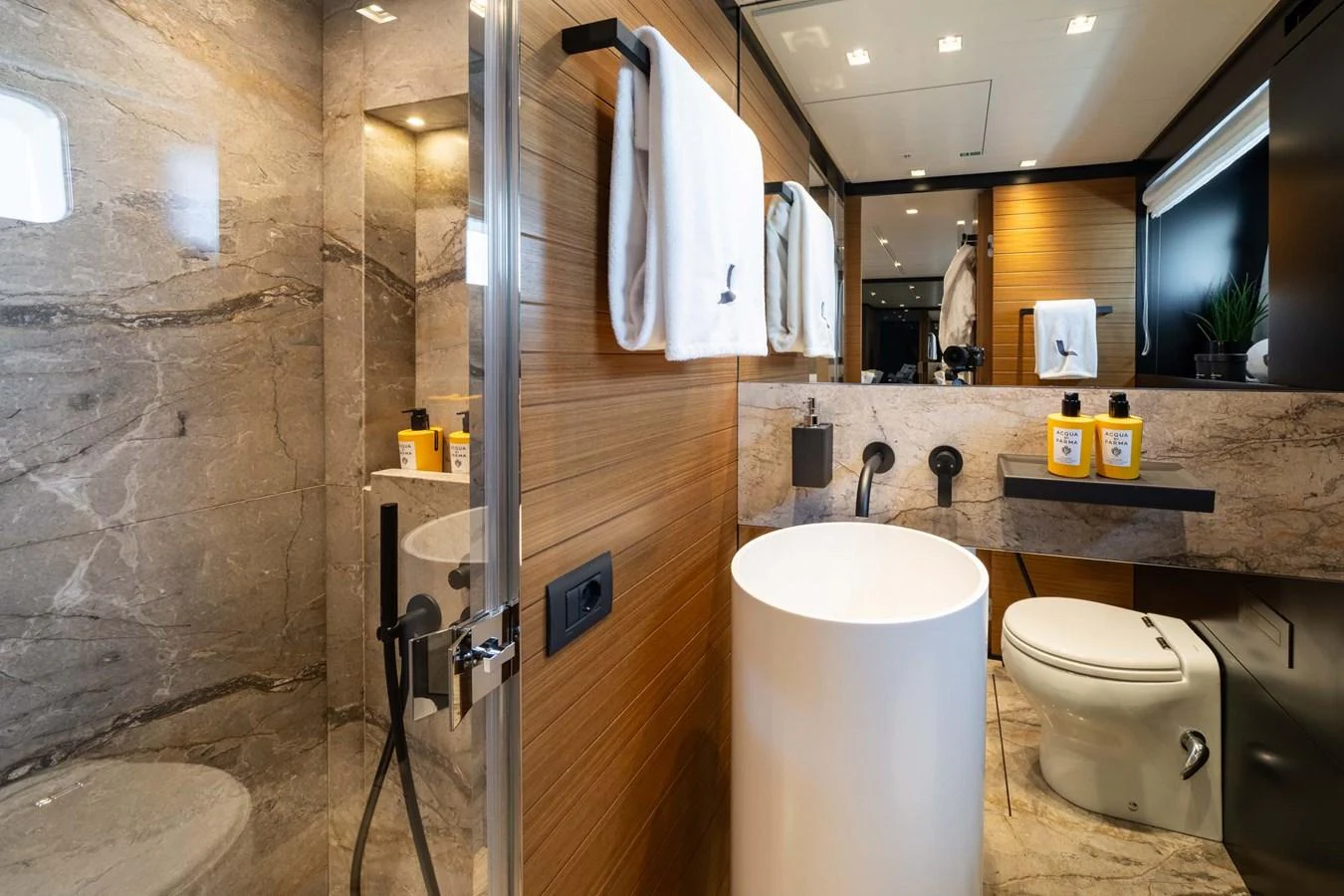 The yacht's bathroom features modern fixtures and luxurious materials, creating a sophisticated and comfortable space. aboard JACKI 8 Yacht for Sale