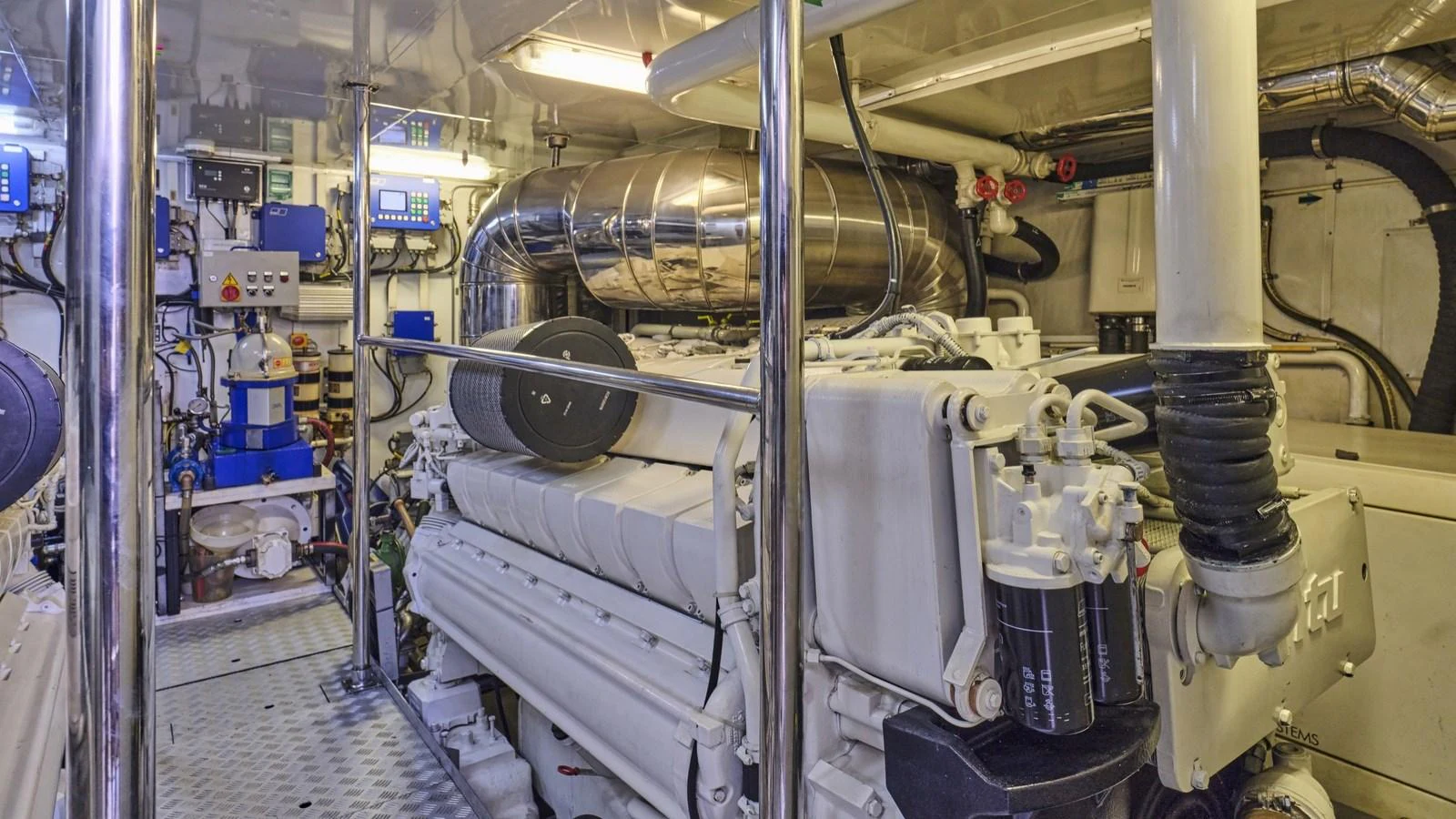 The engine room showcases the yacht's powerful and well-maintained machinery. aboard OASIS Yacht for Sale
