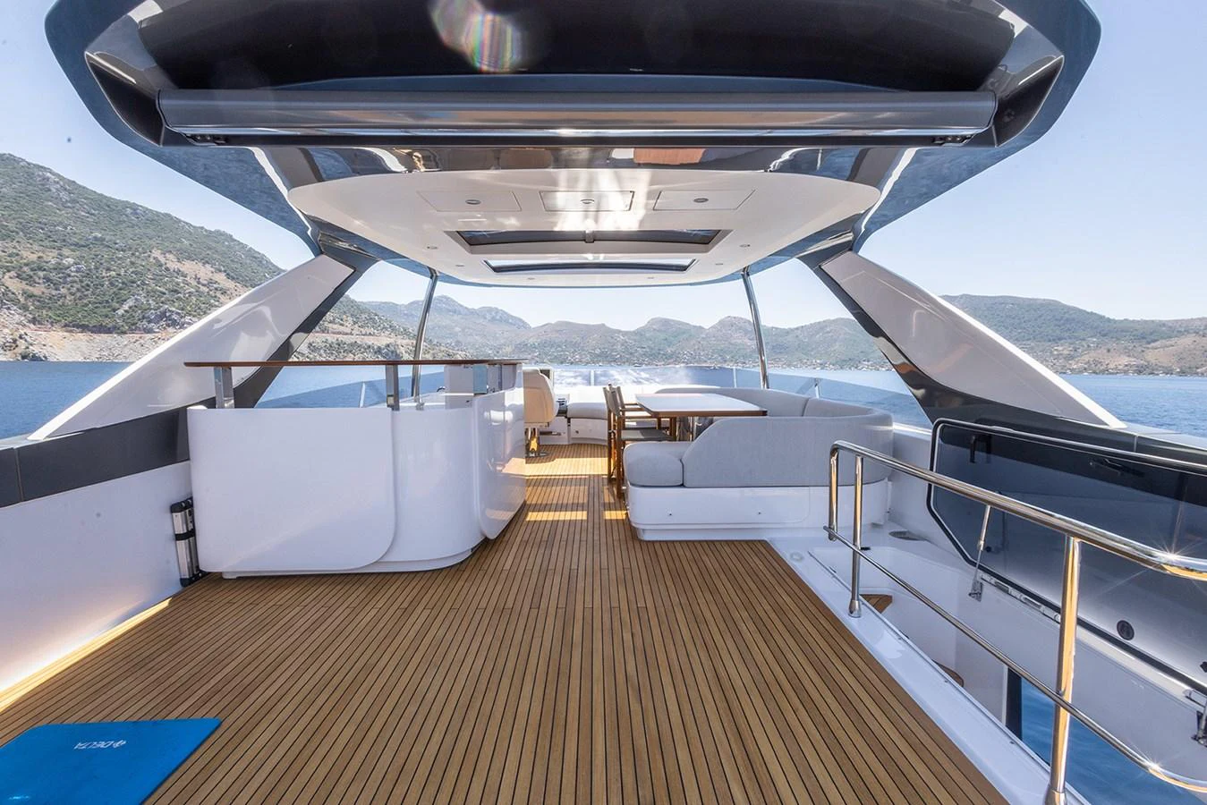 The spacious flybridge offers ample seating and stunning views of the surrounding waters. aboard MILES Yacht for Sale