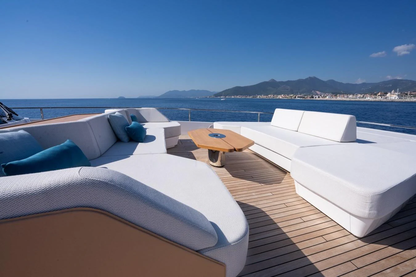 The sundeck features luxurious seating with stunning ocean and mountain views. aboard COME TOGETHER Yacht for Sale
