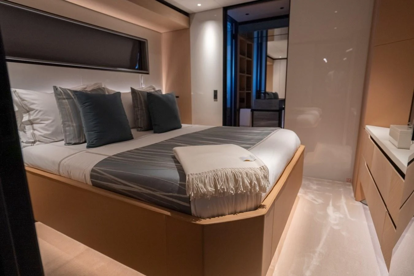 The stateroom offers a cozy and elegant sleeping area with modern design elements. aboard COME TOGETHER Yacht for Sale
