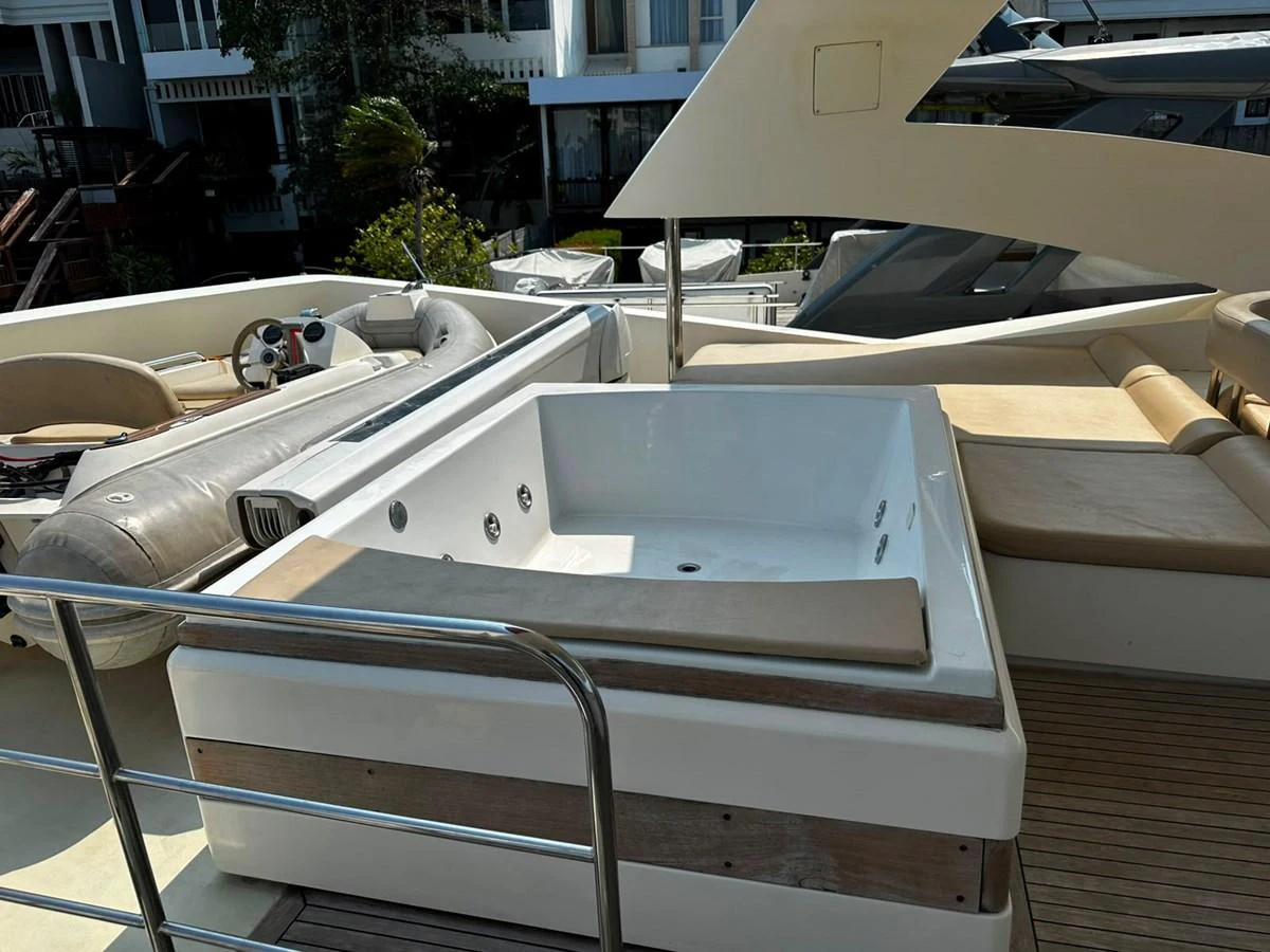The sundeck features a luxurious hot tub and comfortable seating areas for relaxation. aboard GALLEN Yacht for Sale