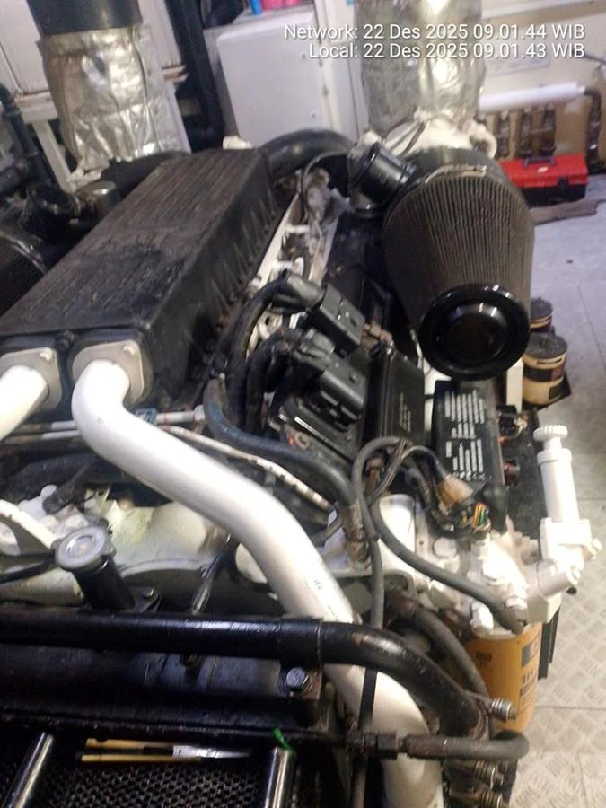 A detailed view of the yacht's engine room showcasing the mechanical components. aboard GALLEN Yacht for Sale