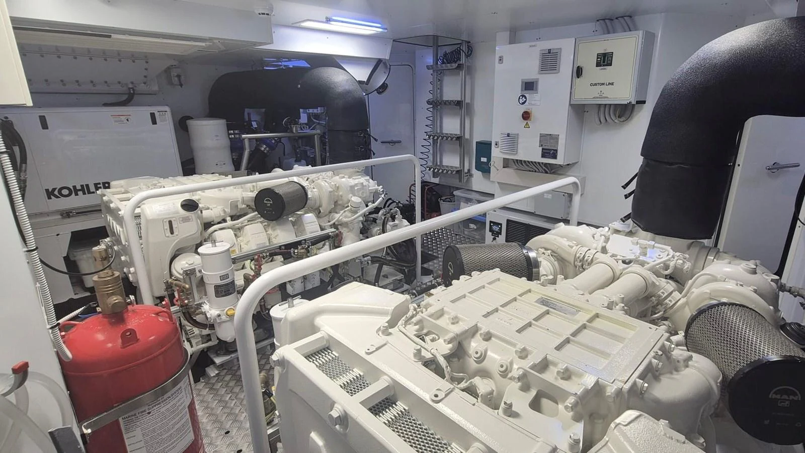 The engine room is equipped with powerful machinery and essential safety equipment. aboard SOLE Yacht for Sale