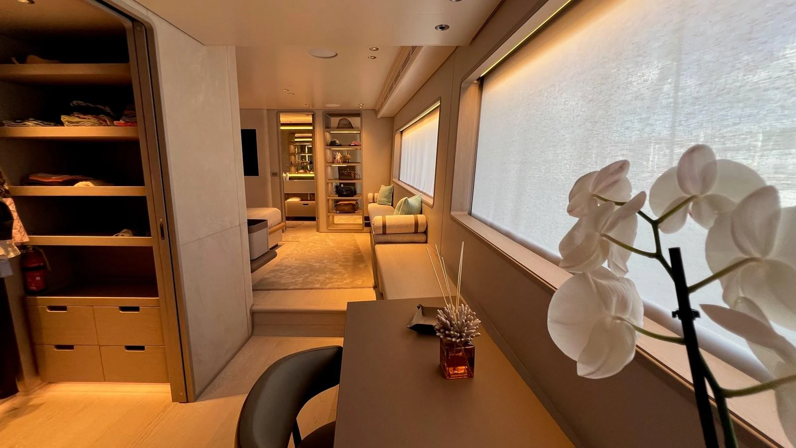 The yacht's interior features a cozy and well-lit living space with modern furnishings. aboard SOLE Yacht for Sale
