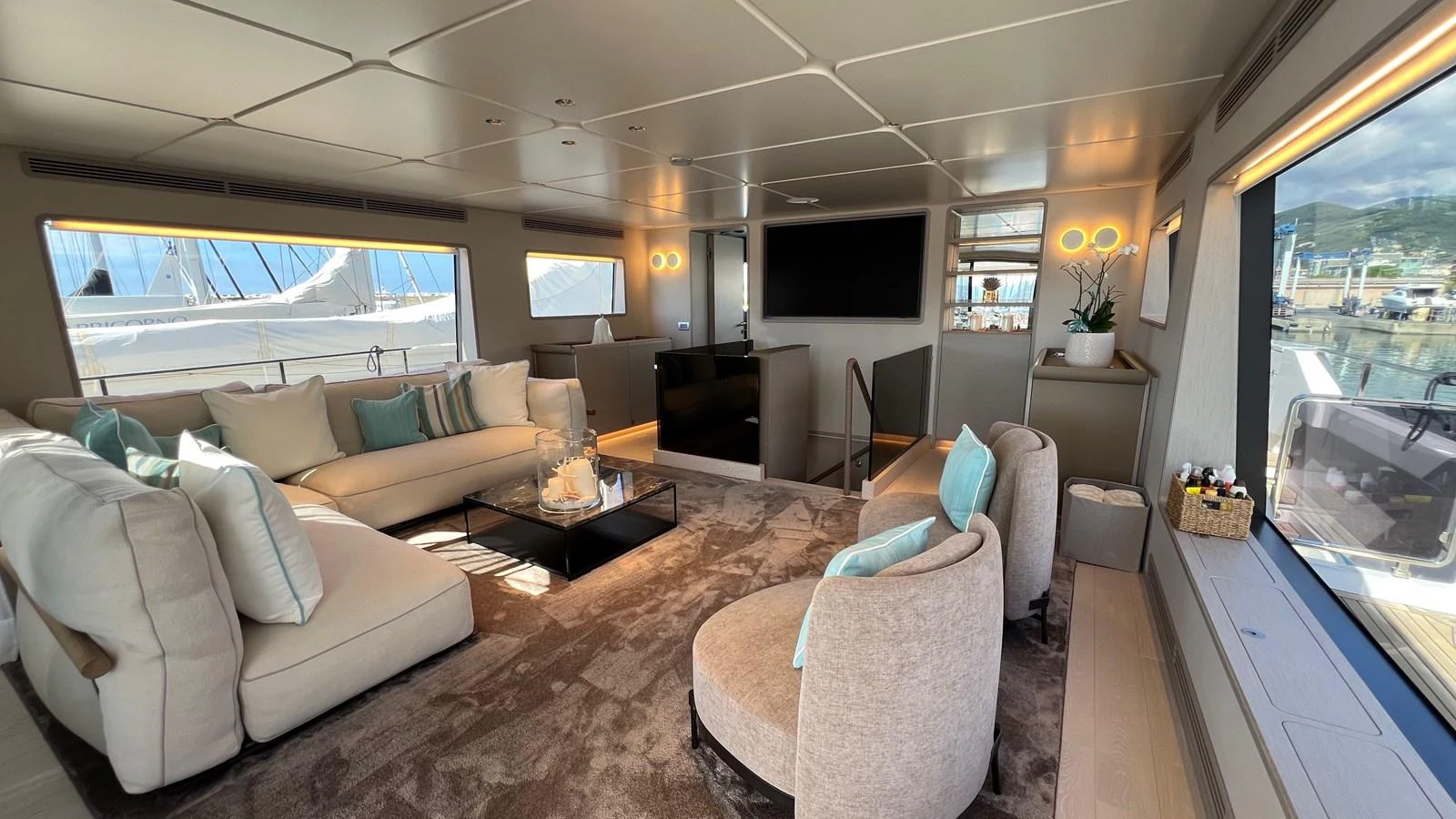 The salon offers a spacious and luxurious seating area with modern decor and ample natural light. aboard SOLE Yacht for Sale