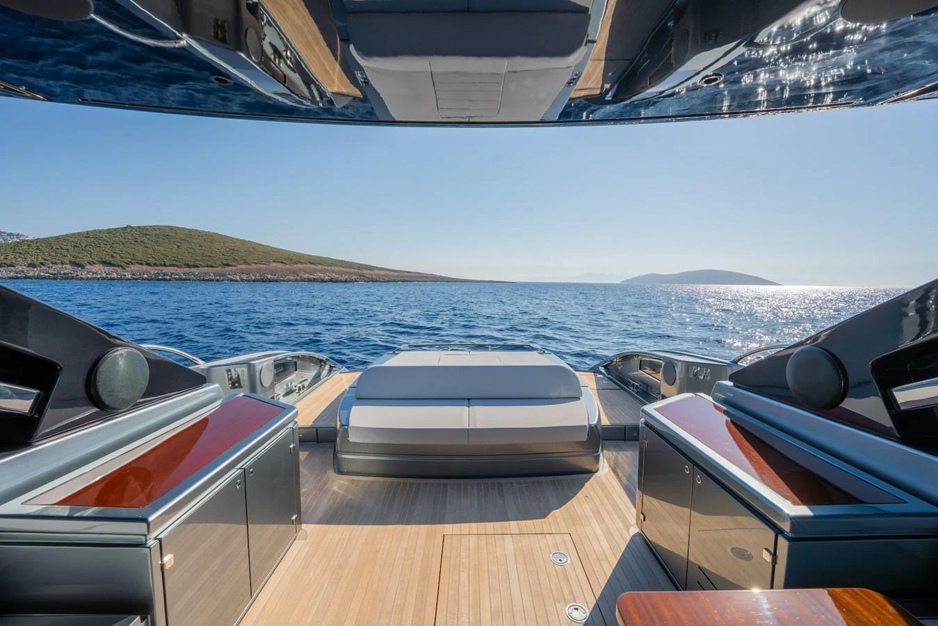 The aft deck offers a spacious and luxurious area with stunning sea views. aboard LUCE I Yacht for Sale