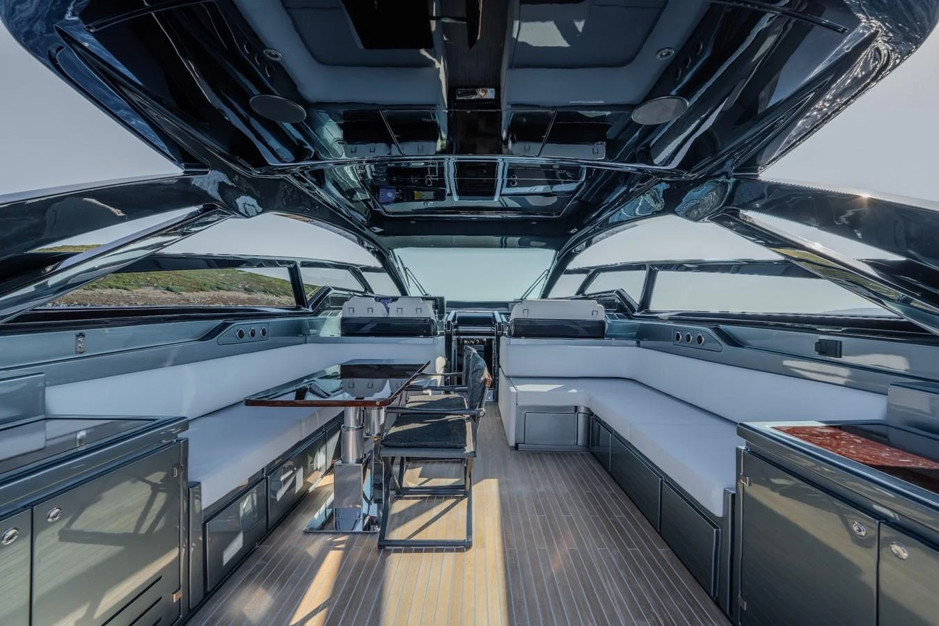 The yacht's cockpit features sleek, modern seating and a spacious layout for relaxation and entertainment. aboard LUCE I Yacht for Sale