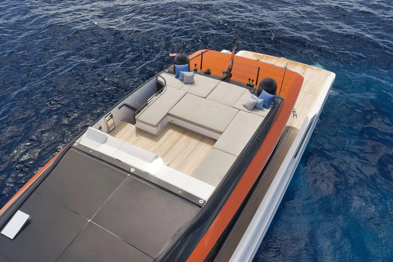 The yacht's aft deck features a spacious sunbathing area with luxurious seating, perfect for relaxation. aboard LAUREN MARIE Yacht for Sale