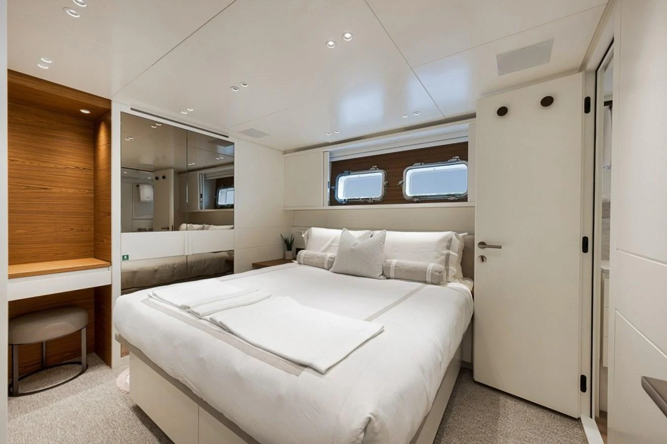 The stateroom offers a serene and luxurious sleeping area with modern amenities. aboard LAUREN MARIE Yacht for Sale