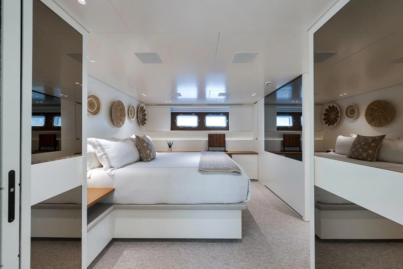 A luxurious stateroom featuring a large bed and elegant decor. aboard LAUREN MARIE Yacht for Sale