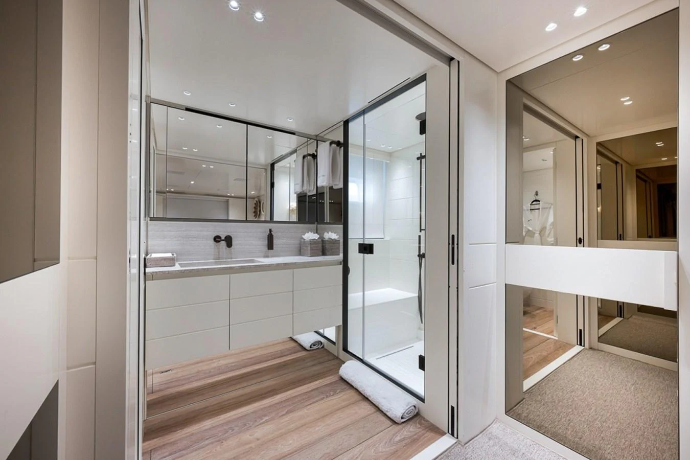 The yacht's bathroom features modern fixtures and a spacious shower area. aboard LAUREN MARIE Yacht for Sale