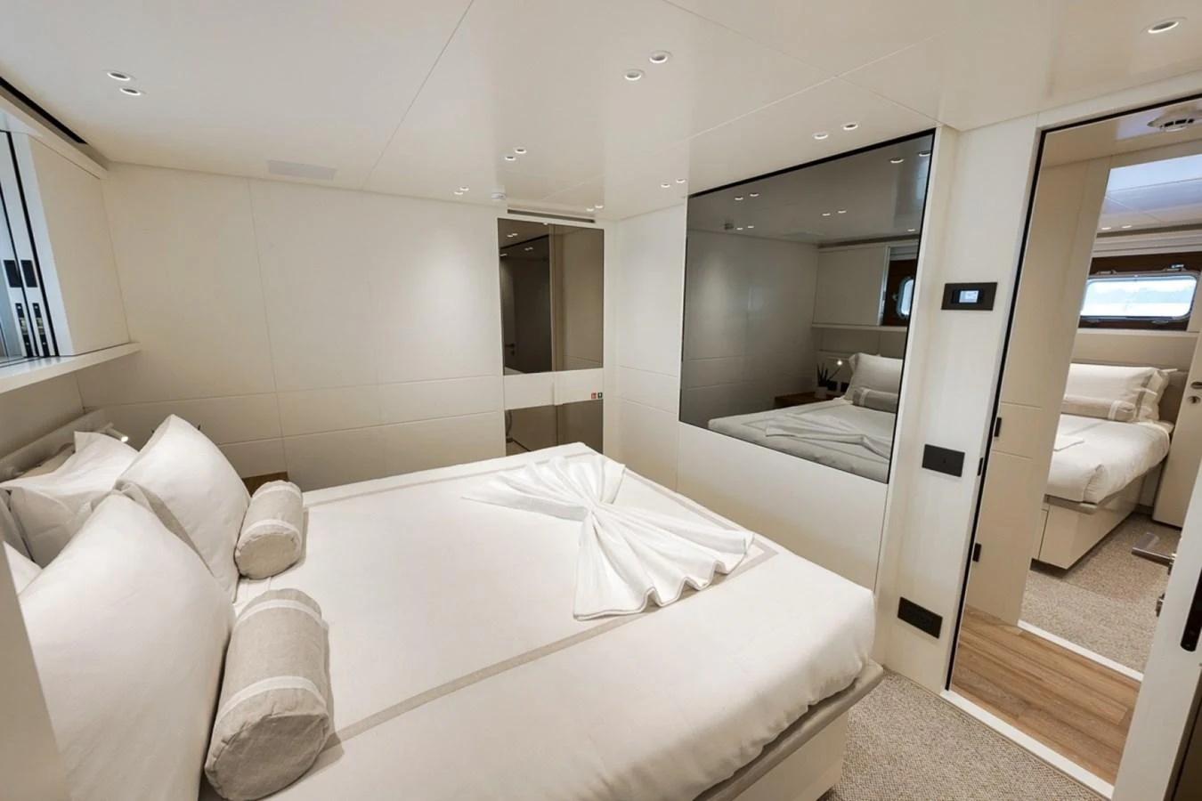 A luxurious stateroom featuring a comfortable bed and elegant decor. aboard LAUREN MARIE Yacht for Sale