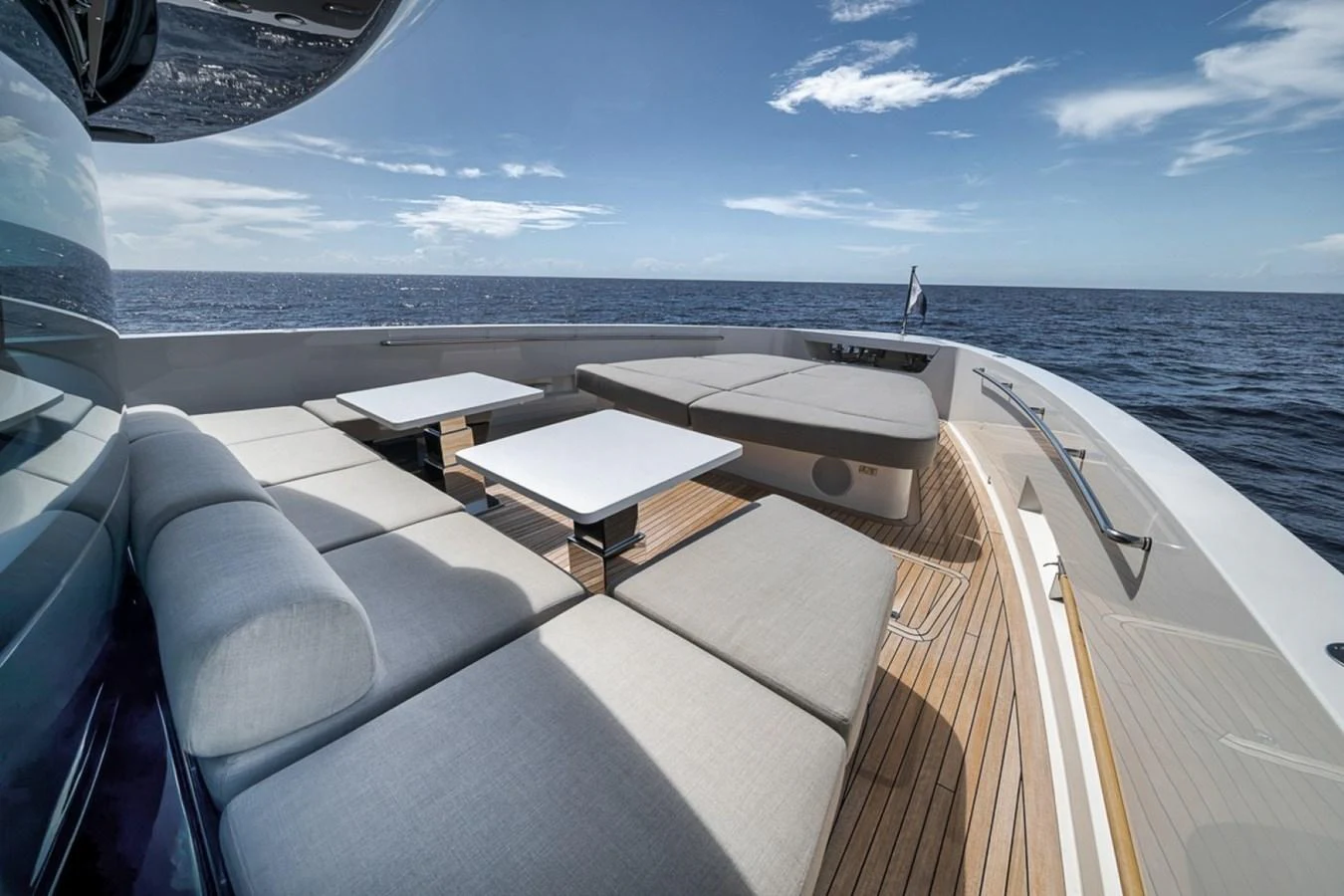 The foredeck offers a luxurious lounging area with comfortable seating and stunning ocean views. aboard LAUREN MARIE Yacht for Sale
