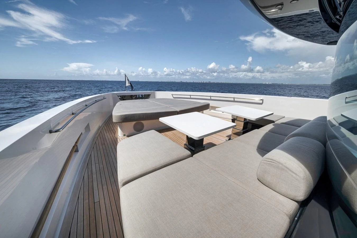 The foredeck offers a spacious lounging area with comfortable seating and stunning ocean views. aboard LAUREN MARIE Yacht for Sale