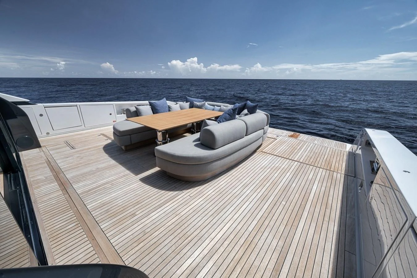 The spacious aft deck features elegant seating and a stunning ocean view. aboard LAUREN MARIE Yacht for Sale