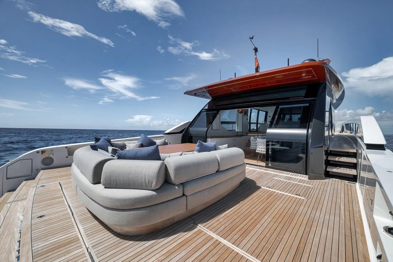 The aft deck features a spacious seating area with plush cushions, perfect for relaxation and socializing. aboard LAUREN MARIE Yacht for Sale