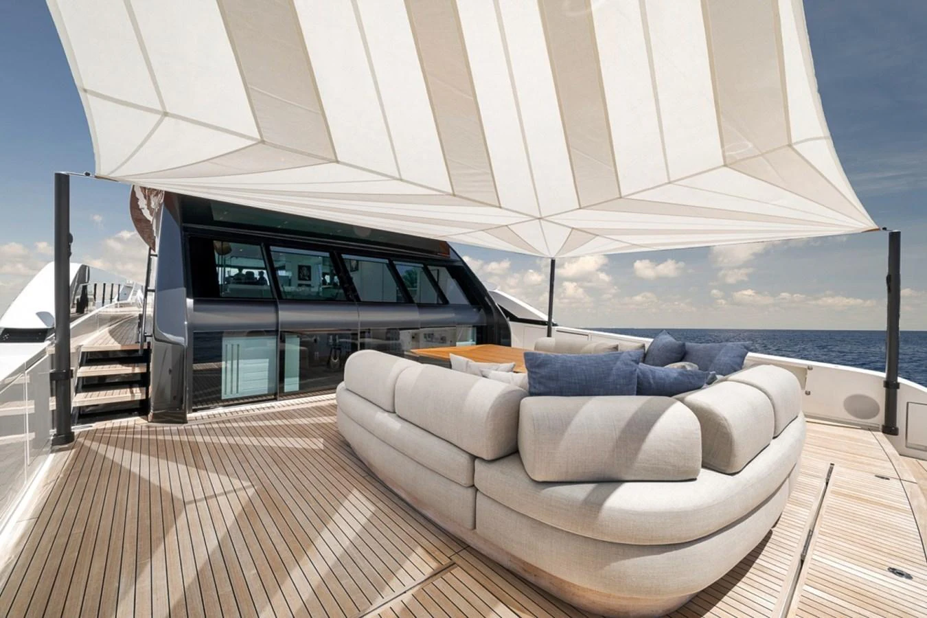 The sundeck features a luxurious seating area under a stylish canopy, perfect for relaxation. aboard LAUREN MARIE Yacht for Sale