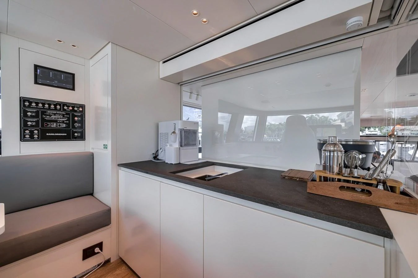 The sleek and modern galley features a minimalist design with high-end appliances and ample counter space. aboard LAUREN MARIE Yacht for Sale