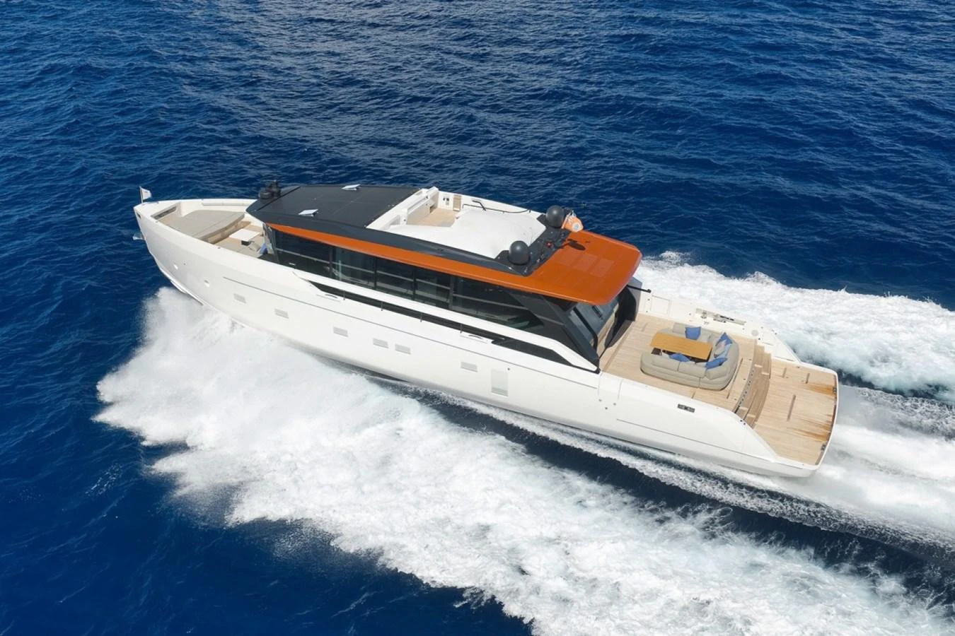 A sleek and modern yacht cruises swiftly through the deep blue sea. aboard LAUREN MARIE Yacht for Sale