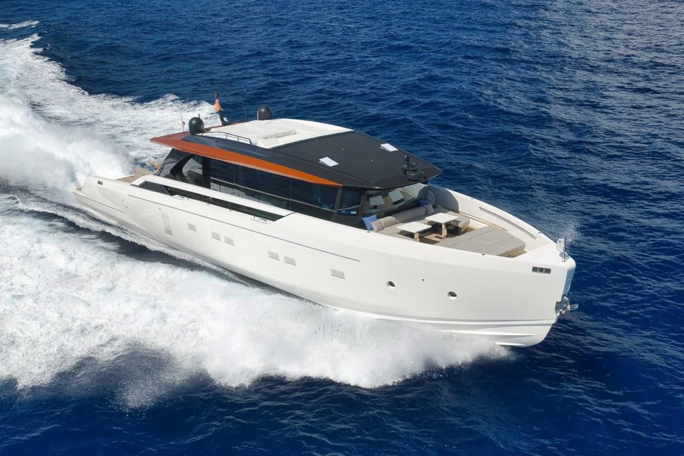 A sleek and modern yacht cruises swiftly through the open sea, showcasing its elegant design and powerful performance. aboard LAUREN MARIE Yacht for Sale