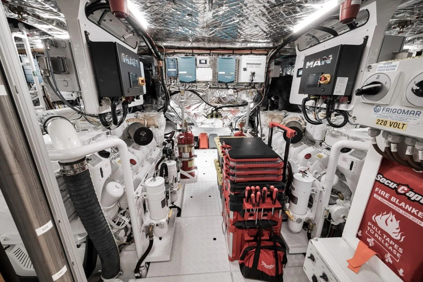 The image showcases the yacht's well-organized engine room with advanced machinery and equipment. aboard LAUREN MARIE Yacht for Sale