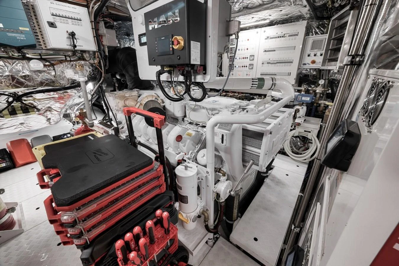The image showcases the yacht's well-maintained engine room with advanced machinery and equipment. aboard LAUREN MARIE Yacht for Sale
