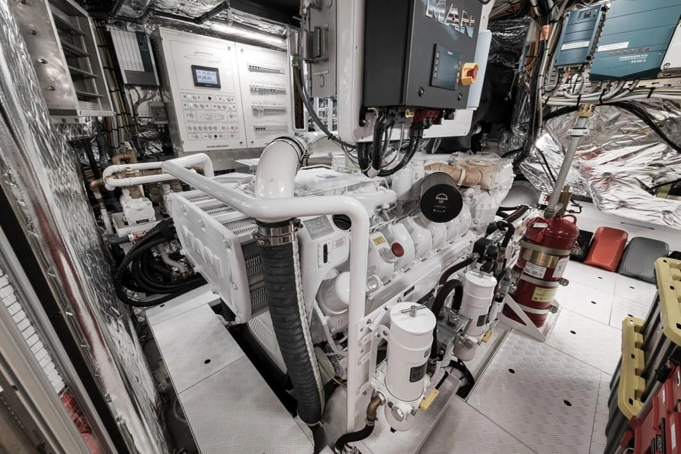The yacht's engine room showcases advanced machinery and meticulous organization. aboard LAUREN MARIE Yacht for Sale