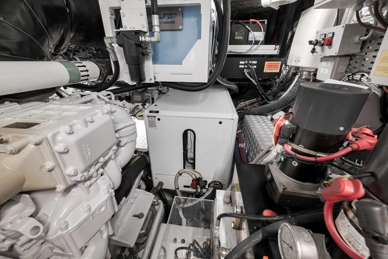 A meticulously organized engine room showcasing advanced mechanical systems and equipment. aboard LAUREN MARIE Yacht for Sale