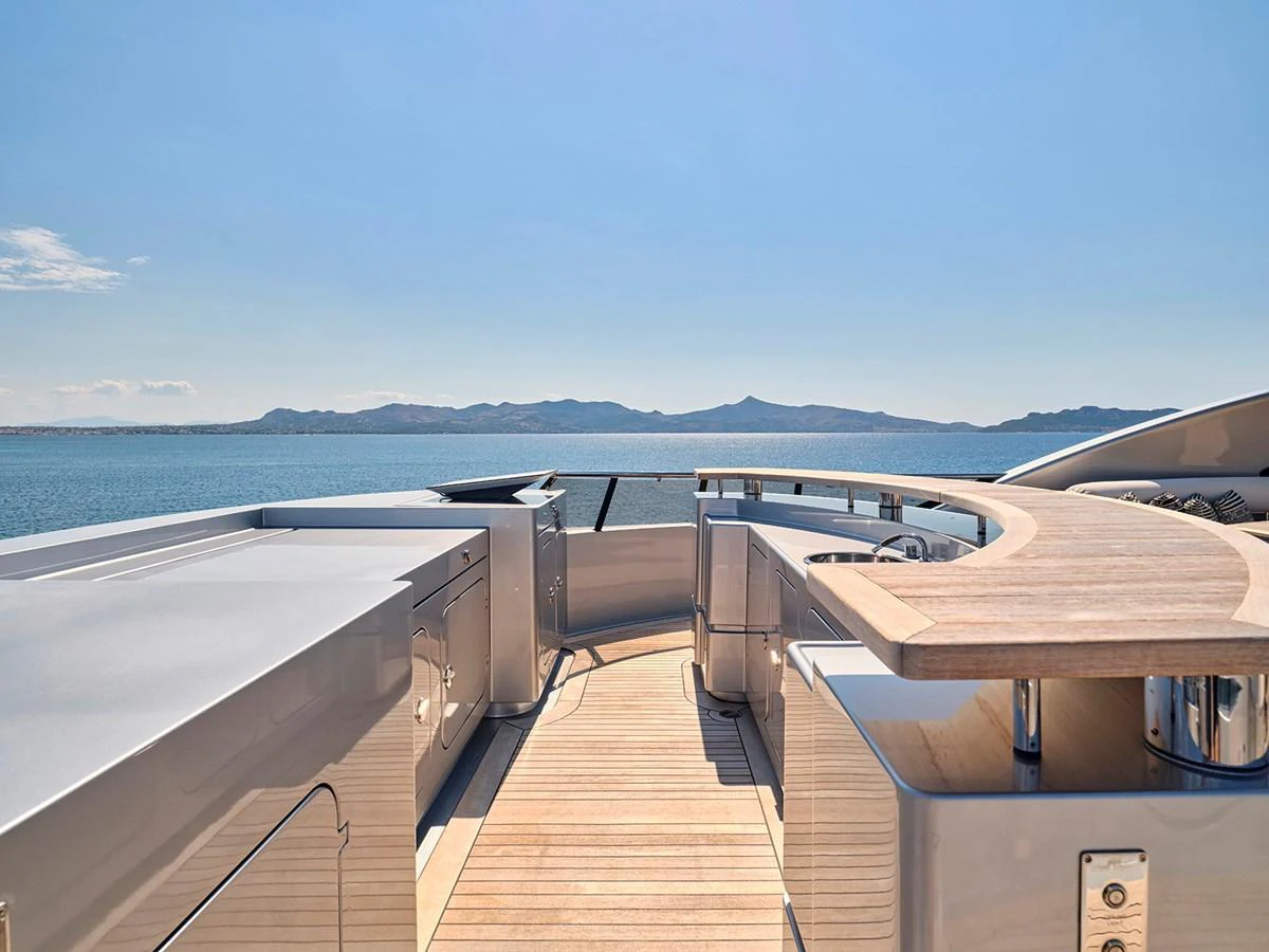 The sundeck offers a spacious and serene area with stunning views of the surrounding waters. aboard BELITA Yacht for Sale