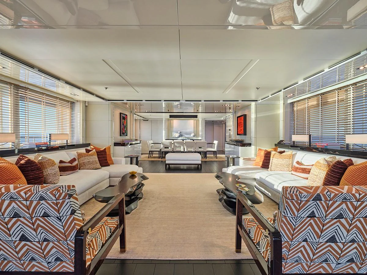 The yacht's salon features a spacious and elegantly designed seating area with modern decor and ample natural light. aboard BELITA Yacht for Sale