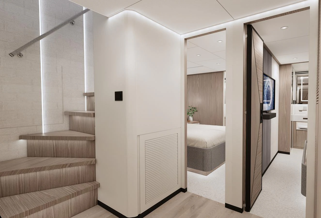 The yacht's interior features a modern staircase leading to a cozy bedroom with elegant decor. aboard HORIZON FD85S Yacht for Sale