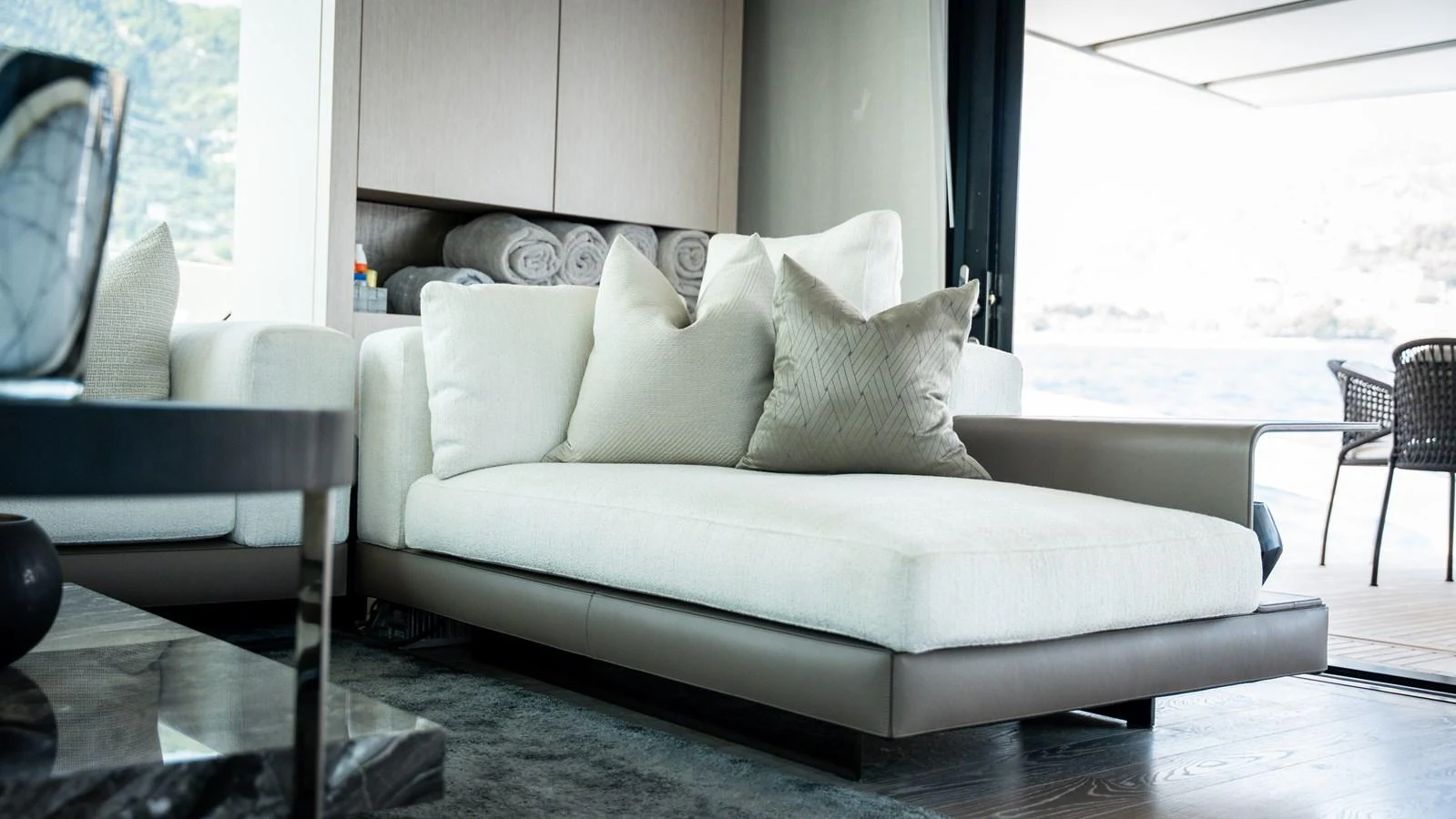 A luxurious seating area with plush cushions and modern decor. aboard LA Yacht for Sale