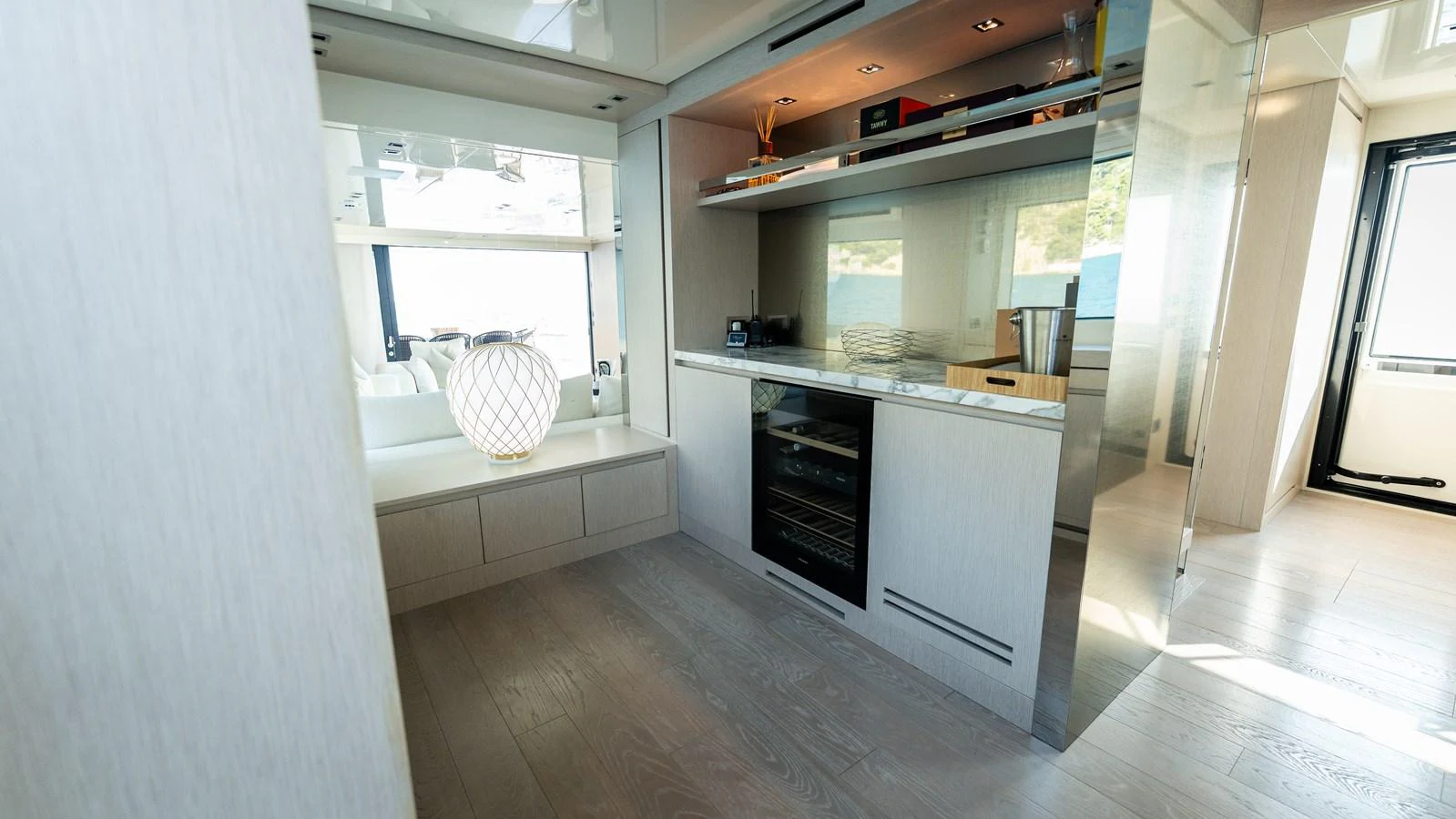 The galley features modern appliances and sleek cabinetry, creating a stylish and functional space. aboard LA Yacht for Sale