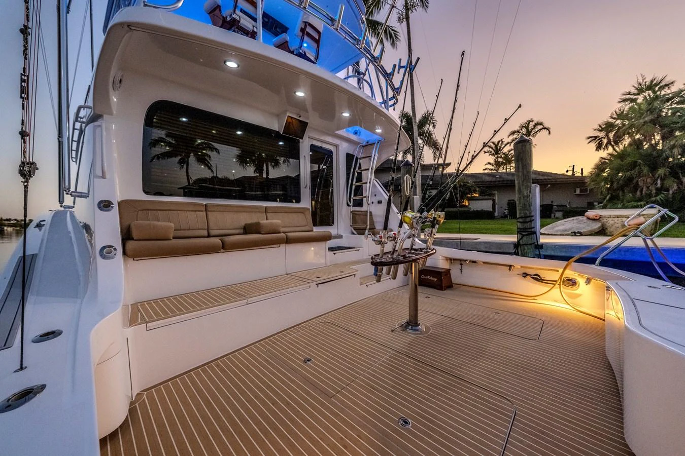 The aft deck offers a spacious and inviting area for relaxation and socializing, featuring comfortable seating and elegant lighting. aboard REEL TEXAN Yacht for Sale