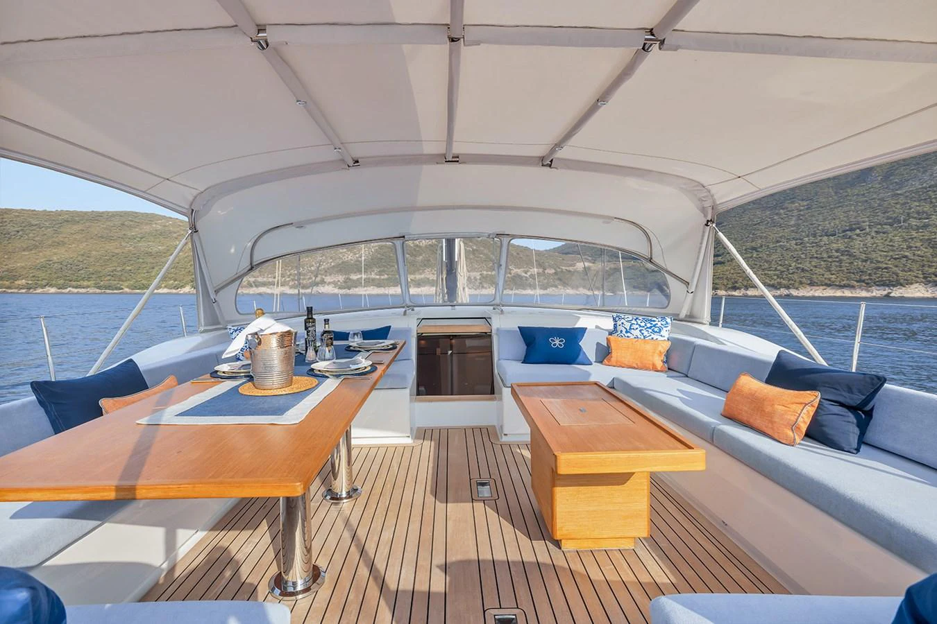 The aft deck offers a spacious and comfortable dining area with stunning views of the surrounding waters. aboard FARFALLA Yacht for Sale