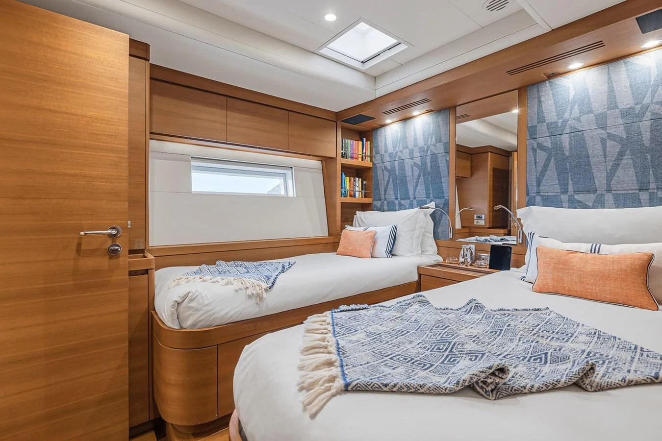 The guest stateroom features twin beds with elegant bedding and ample natural light. aboard FARFALLA Yacht for Sale