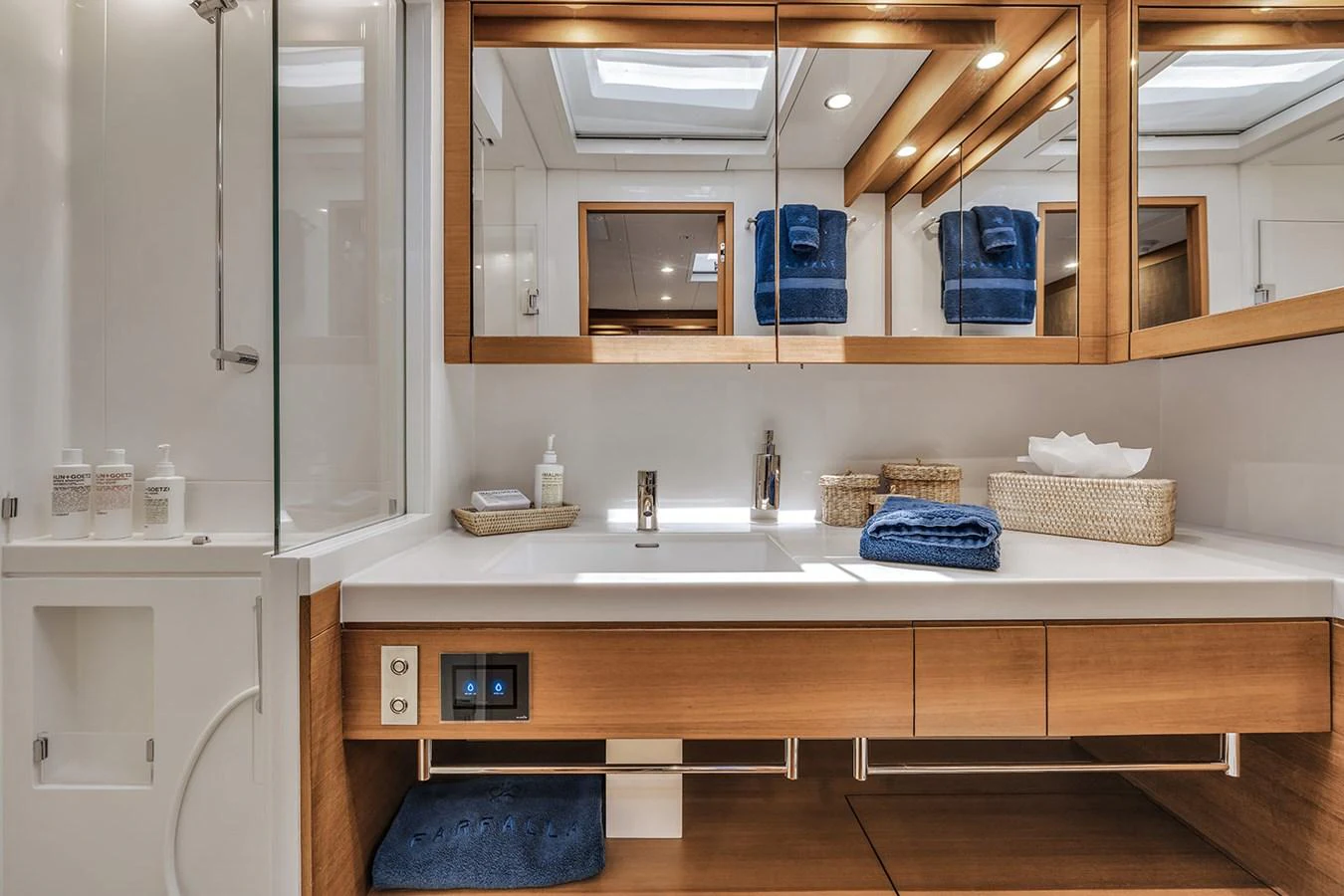 The yacht's bathroom features modern fixtures and ample storage space. aboard FARFALLA Yacht for Sale