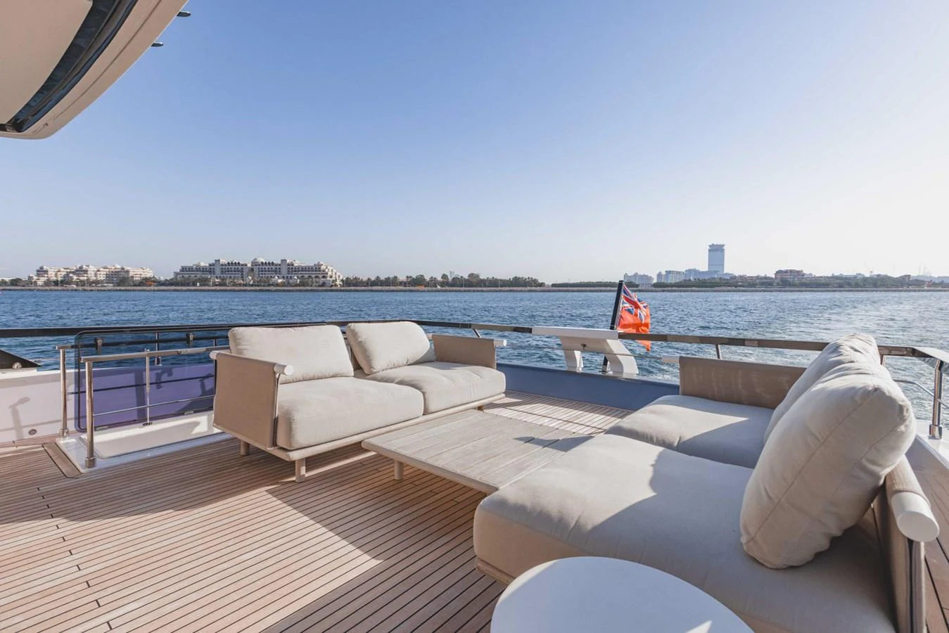 The aft deck offers a spacious and comfortable lounging area with stunning waterfront views. aboard CYRUS Yacht for Sale