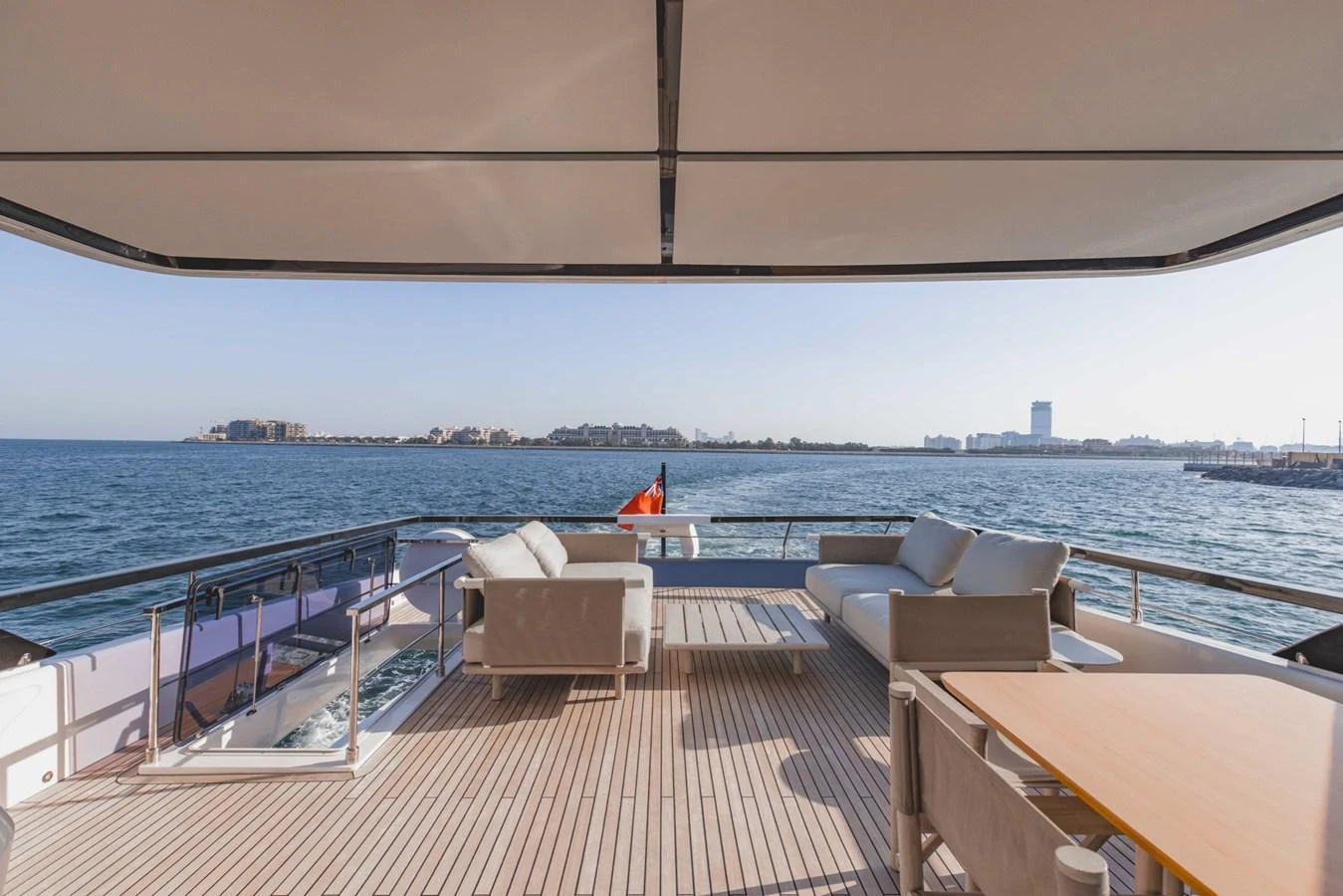 The aft deck offers a spacious and inviting area for relaxation with stunning views of the water. aboard CYRUS Yacht for Sale