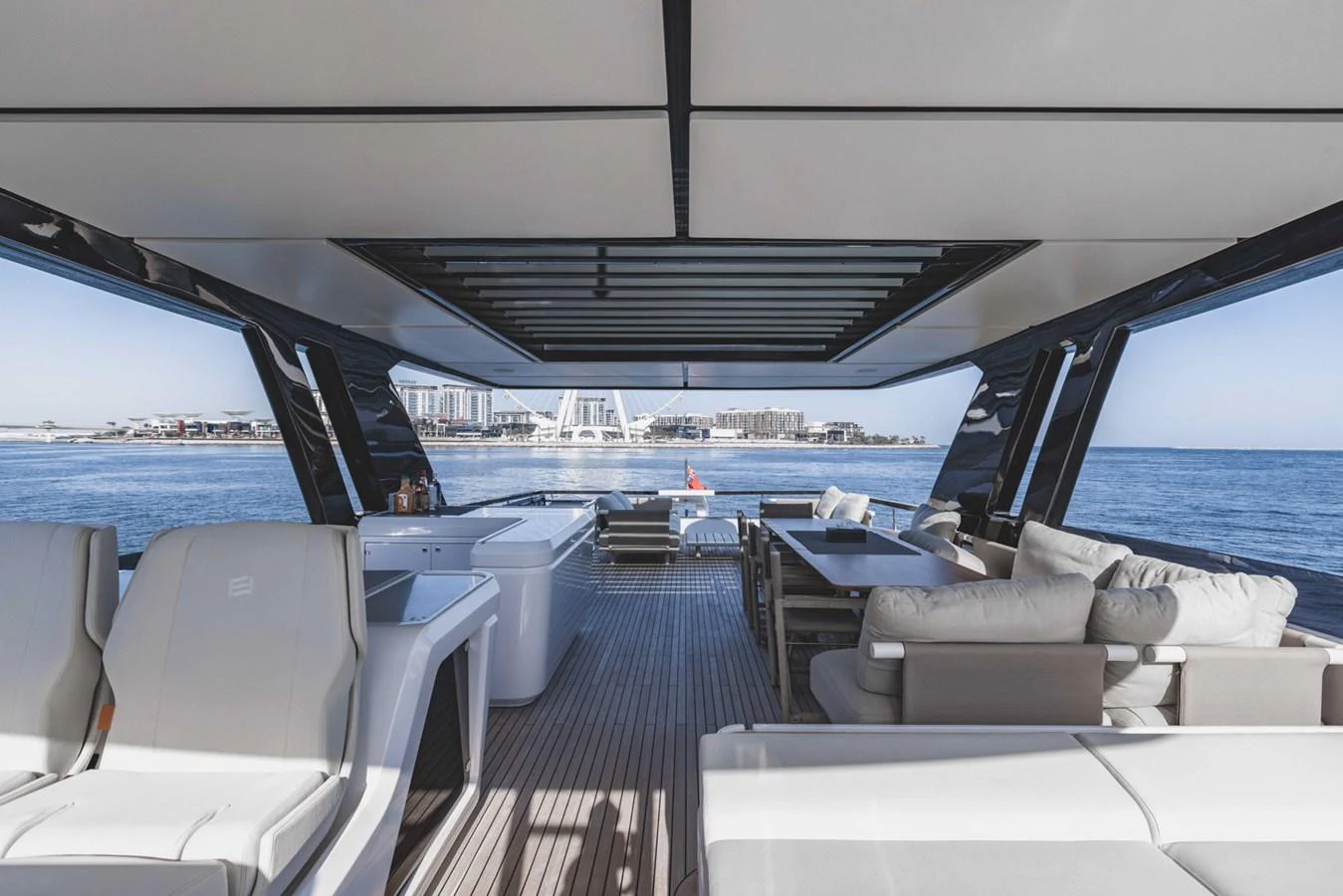 The aft deck offers a spacious and luxurious outdoor living area with comfortable seating and stunning views. aboard CYRUS Yacht for Sale