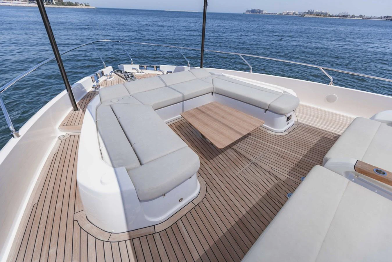 The flybridge offers a spacious seating area with comfortable cushions and a beautiful view of the sea. aboard CYRUS Yacht for Sale
