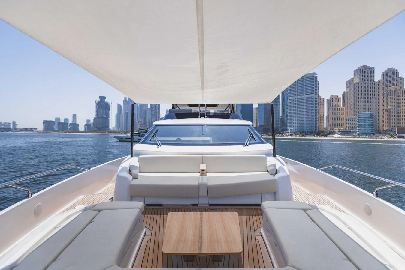 The aft deck offers a spacious and inviting area for relaxation with stunning cityscape views. aboard CYRUS Yacht for Sale
