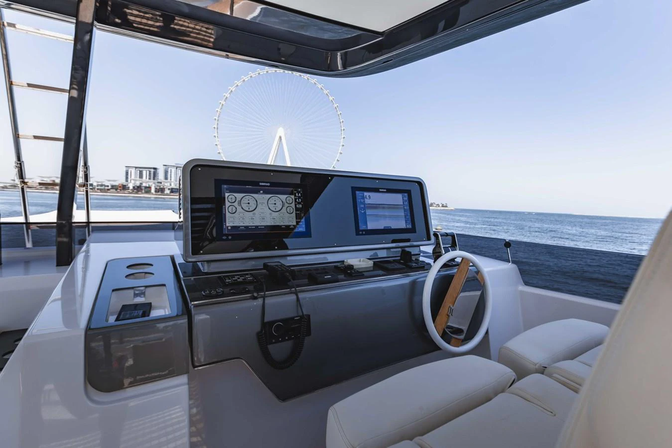 The helm station offers a modern and sleek design with advanced navigation equipment and a stunning sea view. aboard CYRUS Yacht for Sale