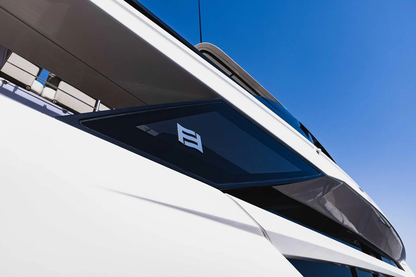 A close-up view of the yacht's sleek and modern exterior design, showcasing its clean lines and sophisticated style. aboard CYRUS Yacht for Sale