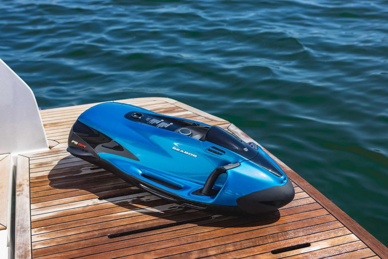 A sleek blue Sea-Doo watercraft rests on the yacht's deck, ready for aquatic adventures. aboard CYRUS Yacht for Sale