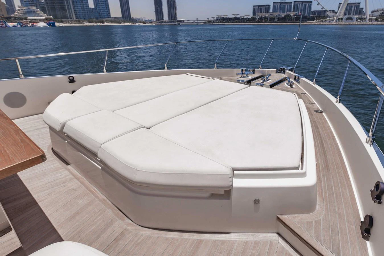 The yacht's foredeck features a spacious sunbathing area with plush cushions, perfect for relaxation. aboard BELLA III Yacht for Sale