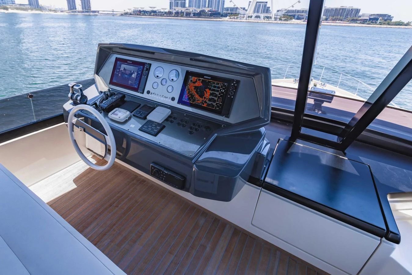 The helm station offers advanced navigation systems and a commanding view of the water. aboard BELLA III Yacht for Sale