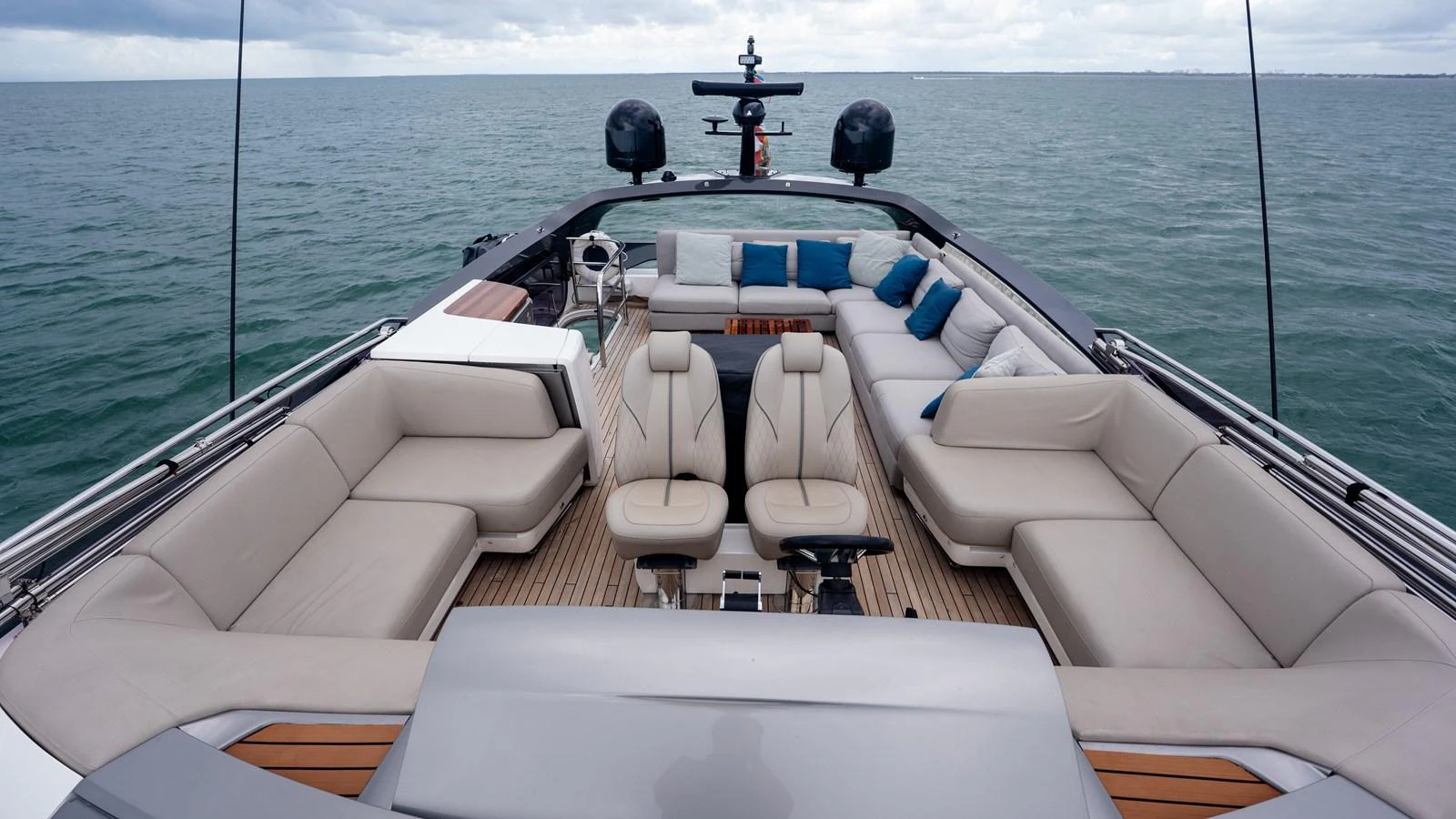 The flybridge offers ample seating with luxurious cushions and a panoramic view of the sea. aboard PARAGON Yacht for Sale